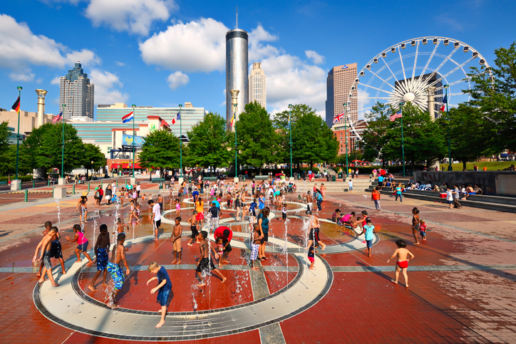 Atlanta, Georgia, USA - August 25, 2013: Children play at Centennial Olympic Park. The park commemorates the 1996 Atlanta Olympics and is a popular attraction.